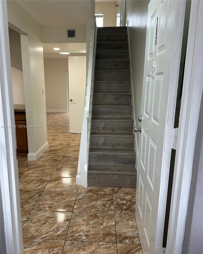 Building Photo - 2780 W 76th St Unit 203
