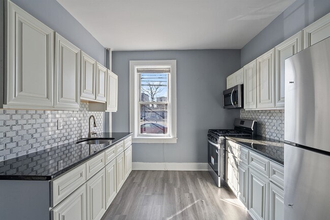 Building Photo - 6700 Park Ave Unit 13