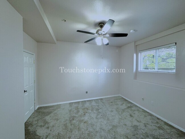 Photo - Light Filled 3 Bedroom Townhome with Deck, Attached Garage, and AC