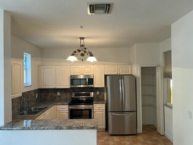 Building Photo - 150 Jacaranda Country Club Dr Unit 102