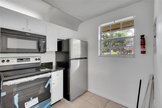 Photo - 855 NW 103rd Ter Unit #201 LIKE NEW UPDATED