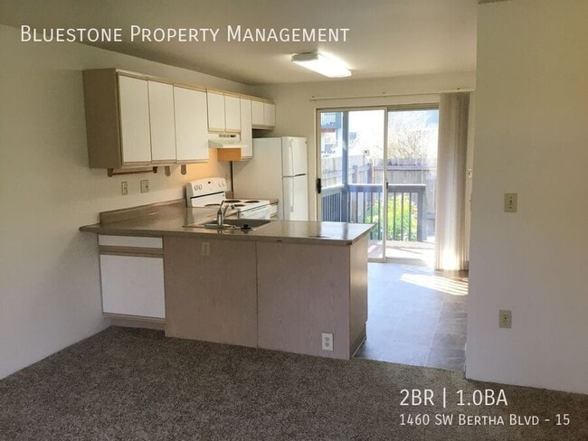 Building Photo - 1460 SW Bertha Blvd Unit 15