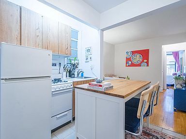 Photo - 211 E 88th St Townhome