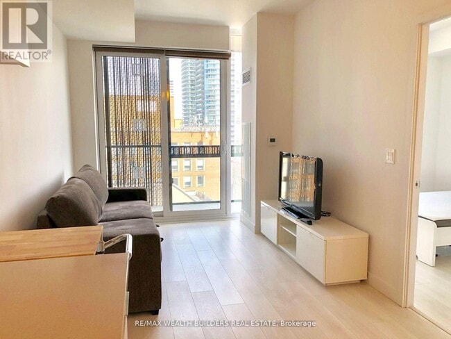 Photo - 8 Eglinton Ave E Unit 1010