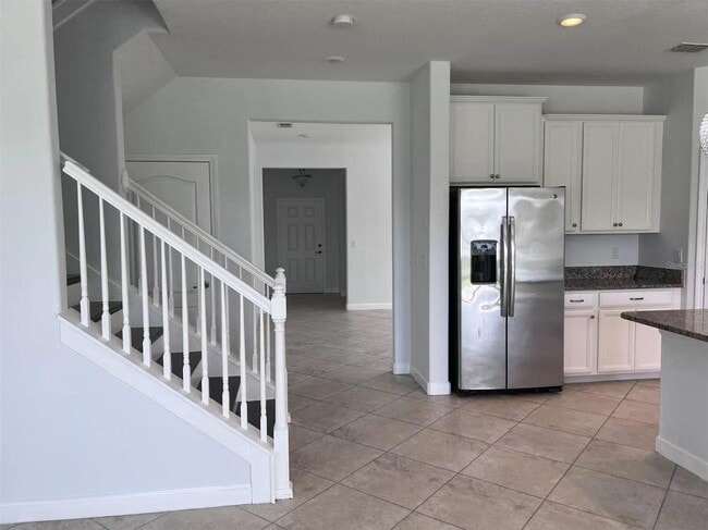 Photo - "Spacious 5-Bed Retreat with Elegant Hardwood & Granite Finishes in Tampa – 3 Full Baths & 3264 S...