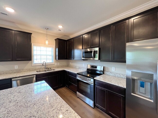 Photo - Beautiful Like-New 3 bed/2.5 bath w/ 2-car garage & fenced in backyard available June 24th!