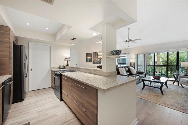 Building Photo - 11863 Wimbledon Cir Unit 525