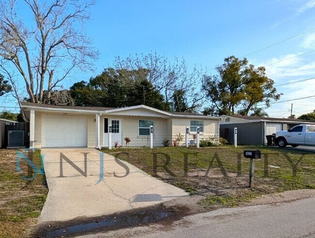 Photo - Fabulous 3/1/1 980 Sq. Ft. with NEW AC, NEW flooring, UPDATED kitchen & bath with GRANITE counter...