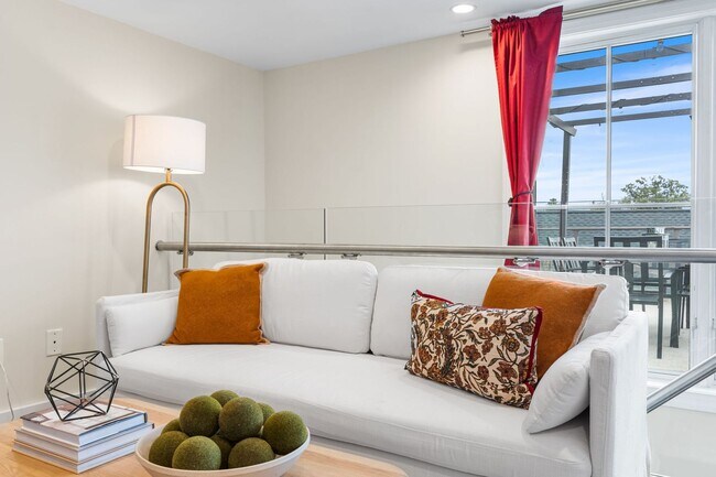 Photo - Stylish 2BR/2BA Bi-Level Condo with Private Roof Deck and Covered Parking!