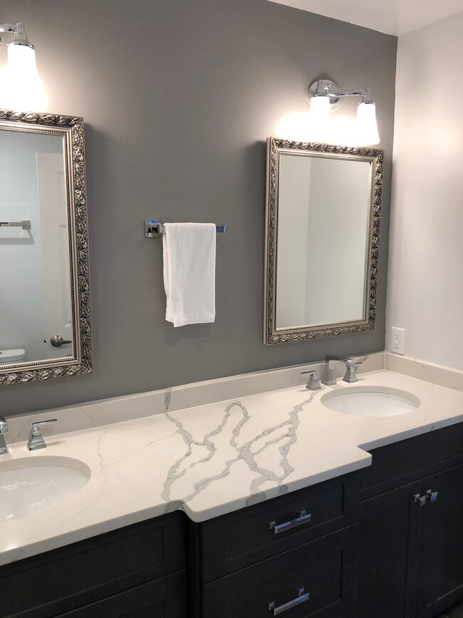 Quartz double sink and all new cabinets and mirrors - 11 Veterans Way Townhome