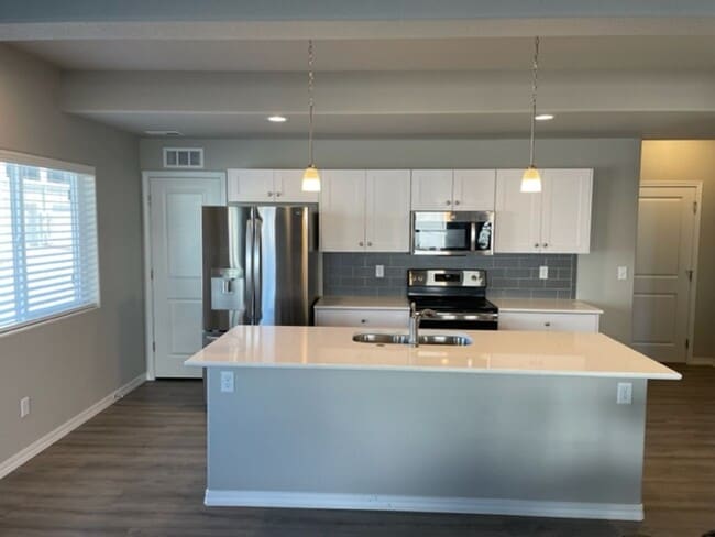 Photo - LIKE NEW 3BD TOWNHOME w/2.5 CAR GARAGE and A/C in NE COL SPGS - Deposit Waiver Available