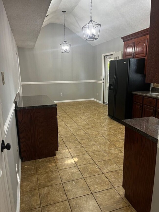 Photo - Charming All-Brick Corner Lot Home with Hot Tub & Fenced Yard