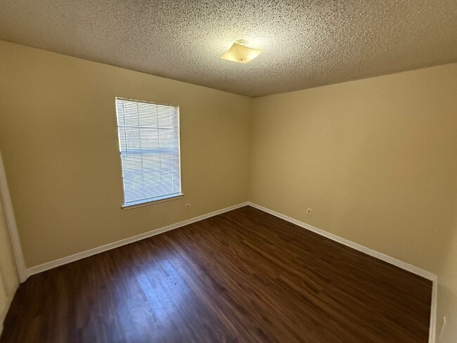 Photo - Freshly painted unit. Positioned along Navco Road, the home offers convenient access to major rou...