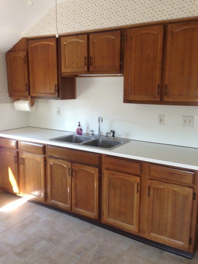 Eat in Kitchen , Cabinets are in the process of being updated. - 22 1/2 Rena St Unit Second floor