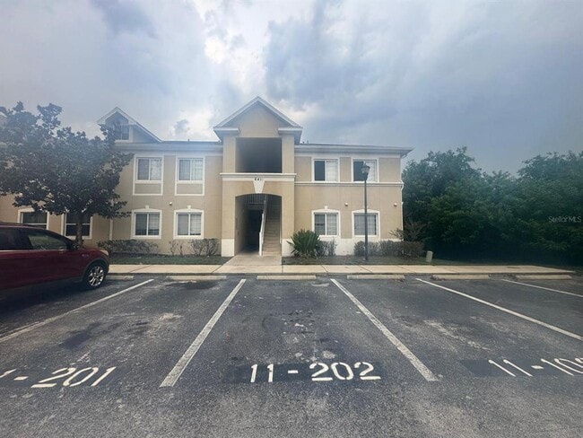 Building Photo - 6411 Cypressdale Dr Unit 202
