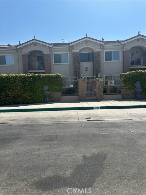 Building Photo - 17888 Alburtis Ave Unit A102 Rental