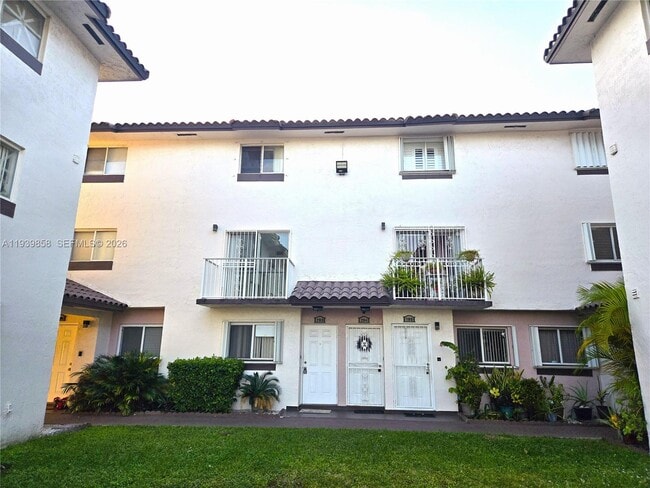 Building Photo - 1100 SW 104th Ct Unit E-203