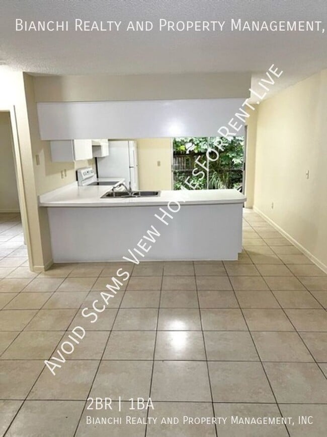 Building Photo - 5875 157th Ave N Unit #B