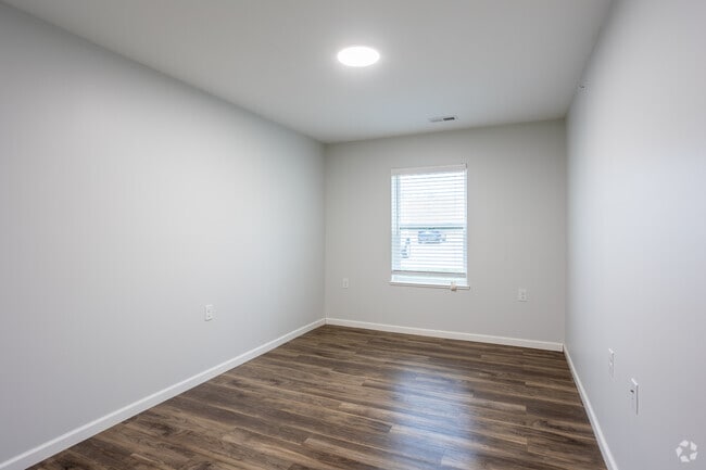 2BR, 1BA - 956SF - Primary Bedroom - Cottage Bluff Apartments