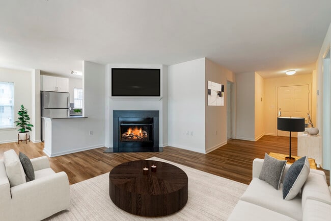 Renovated Package II living area with hard surface plank flooring