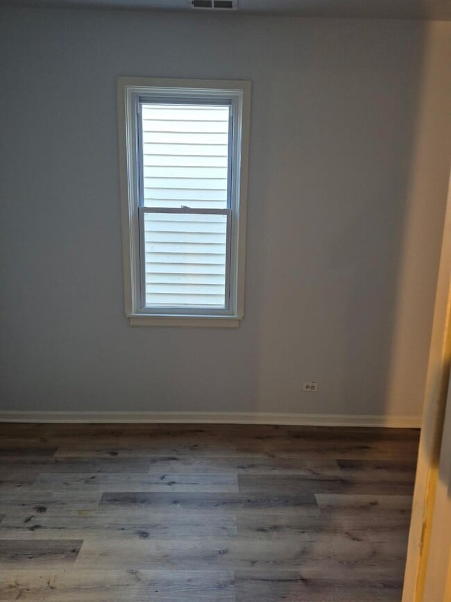 bed 1 - 8702 S Escanaba Ave Unit #2 Front