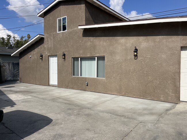 Exterior Upgrades: New stucco, roofing, and a fresh paint job make for great curb appeal. - 945 E 3rd St Casa