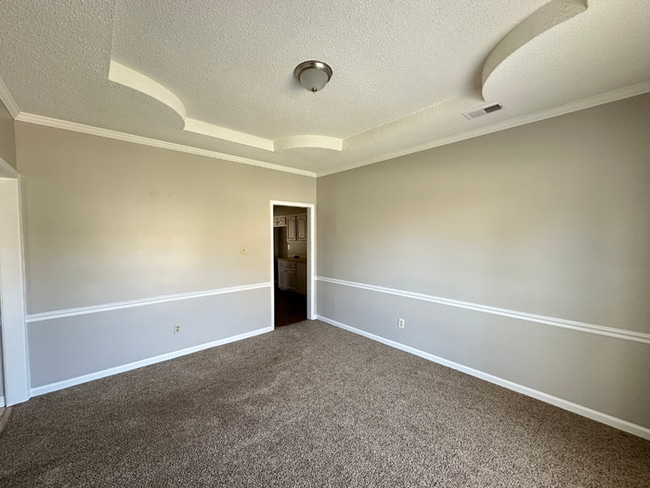 Photo - Grand 4BR/2BA Near Southwind | 2,438 Sq Ft, Stone Fireplace, Soaking Tub & 2-Car Garage