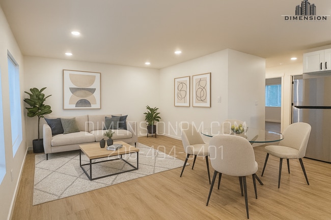 Building Photo - 5811 27th St NE Unit B