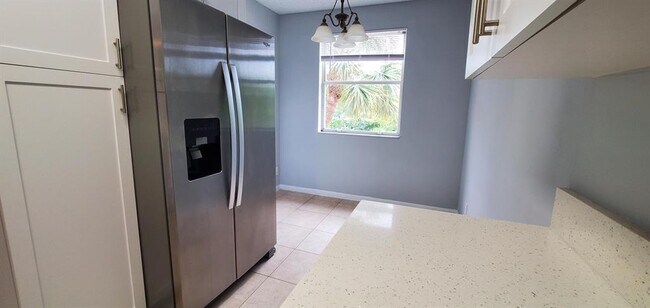 Photo - 9033 Wiles Rd Unit 9033 Wiles Rd