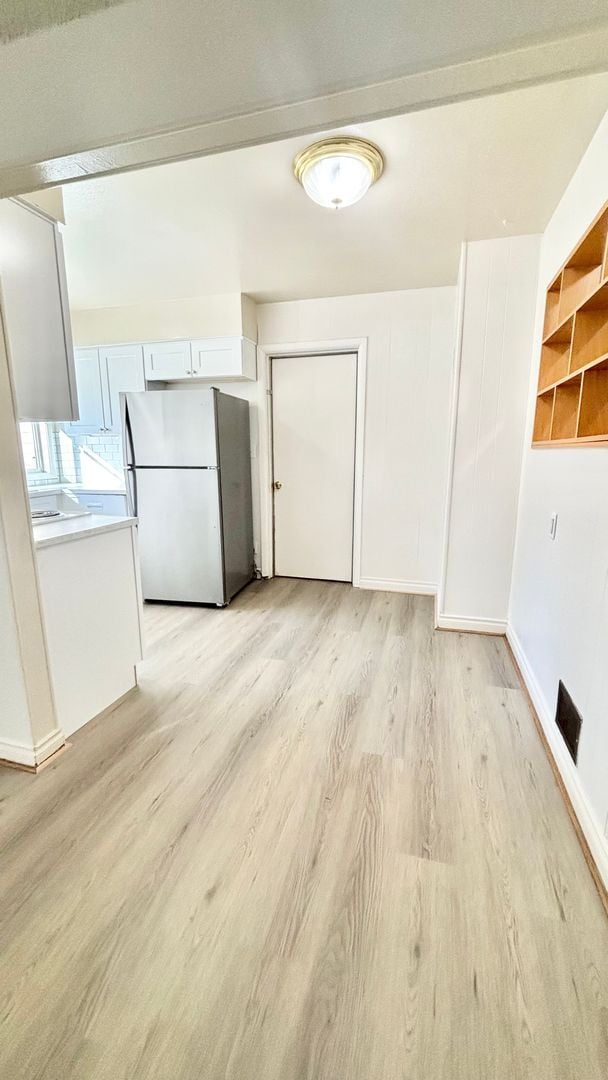 Photo - Recently Renovated House With Fenced Back Yard, Attached Garage, and Basement