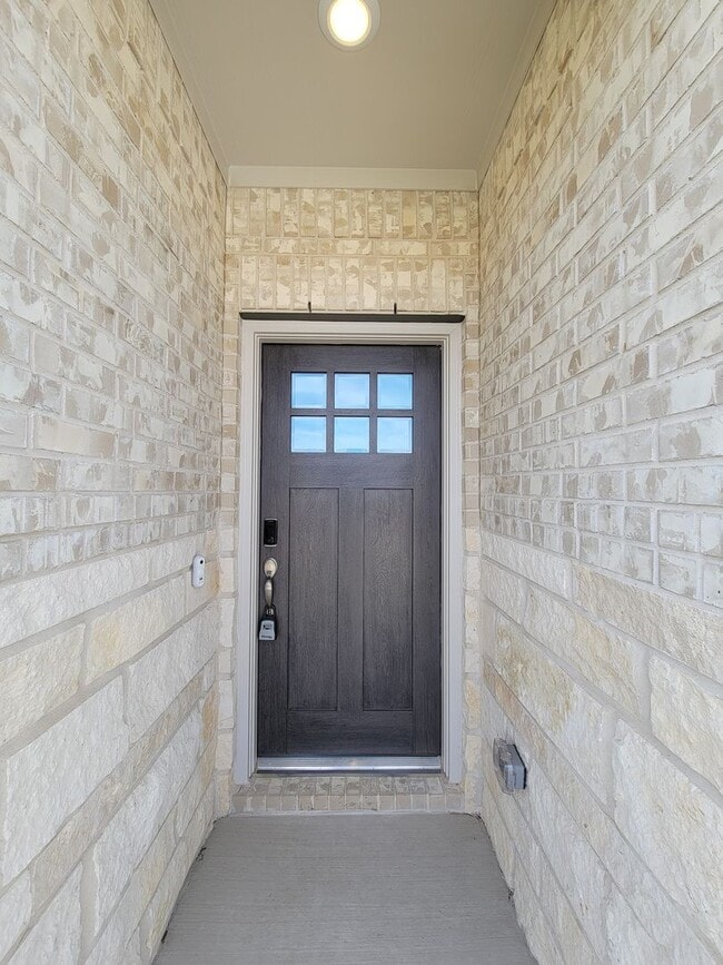 Photo - Single-story layout features a bright, open concept living area, dining space, and kitchen. Pebbl...