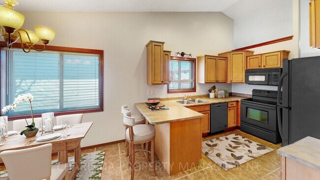 Photo - BEAUTIFUL 4 BD, 2 BA TOWNHOME WITH A FULLY EQUIPED KITCHEN, VAULTED CEILINGS, FIREPLACE, ATTACHED...