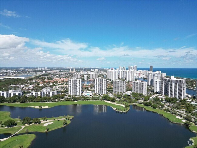 Building Photo - 3675 N Country Club Dr Unit 1006 Rental