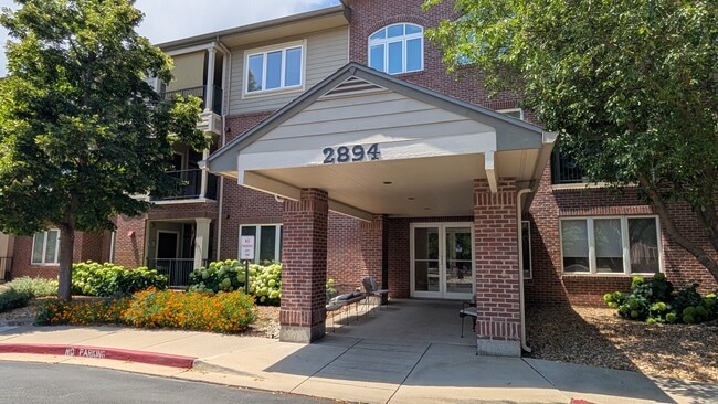 Front Entrance to building - 2894 W Riverwalk Cir Condo Unit B204