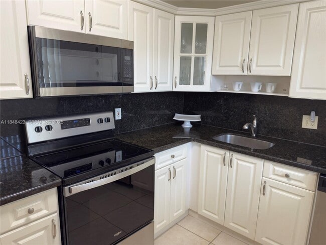 Building Photo - 7765 SW 86th St Unit F2-404