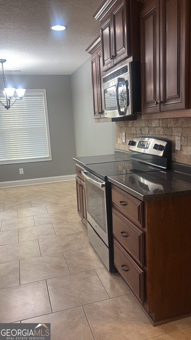 Photo - 303 S Charity Ln