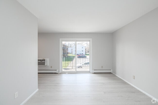 2BR, 1BA - 800SF - Living Room - 828 Holly Gardens