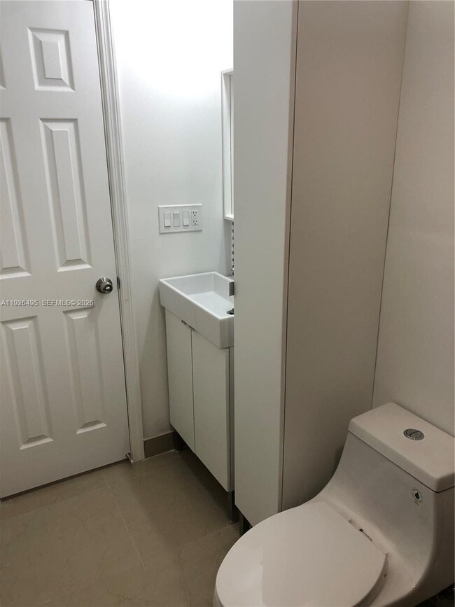 Building Photo - 2465 NE 183rd St Unit 2