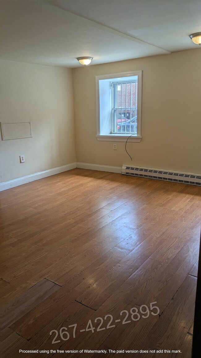 Building Photo - 126 S 46th St Unit AptC