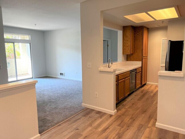 Photo - Spacious 2BR/2BA Redwood Shores Condo with Balcony, Natural Light & Garage Parking