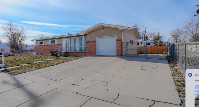 Building Photo - Comfort & Convenience: 3BR Home with Garage, RV Parking, and Flex Room