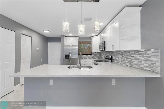 Photo - 11477 NW 39th Ct Condominio Unidad 305