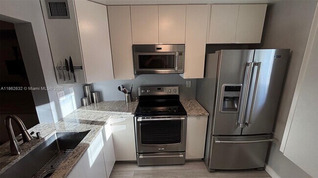 Building Photo - 2761 S Oakland Forest Dr Unit 103 Rental