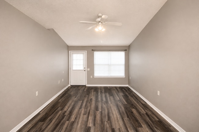 Photo - 2BR Patio Home with LVP Flooring, Private Fenced Yard, & Convenient Blue Angel Pkwy Location Near...