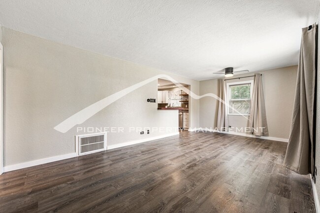 Photo - Charming single family home with fully fenced yard