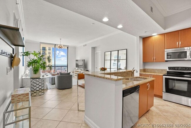 Building Photo - 701 S Olive Ave Unit 1003