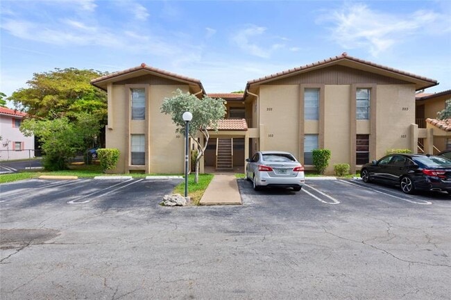 Building Photo - 11101 Royal Palm Blvd Unit 102 Rental