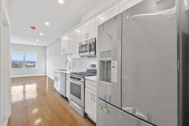 Photo - 311-315-315 West Side Ave Unit 105