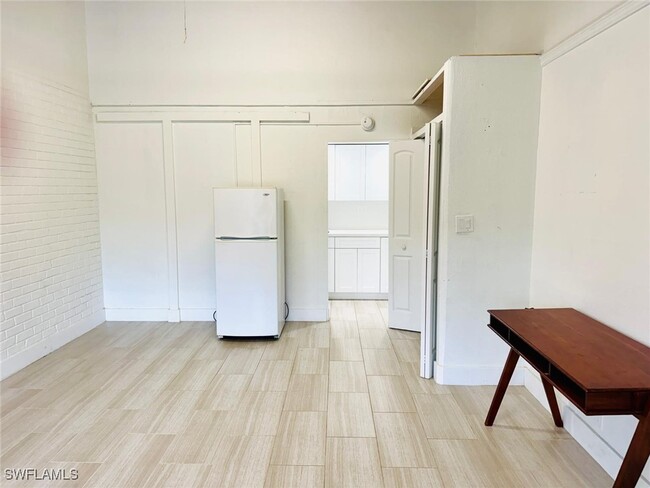 Building Photo - 4050 Golden Gate Pkwy Unit 219