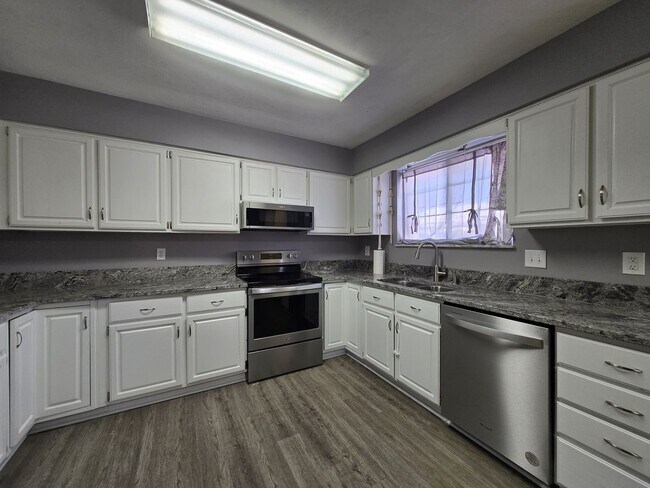 Photo - Spacious 5-Bedroom Family Home